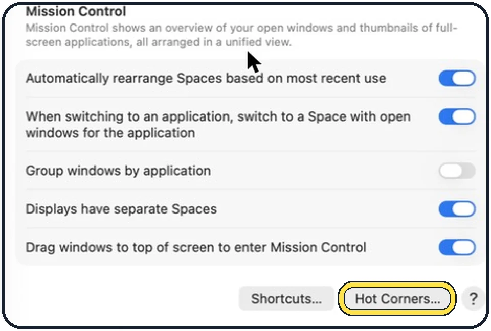 Part of the Mac System Settings window: Scroll to the bottom and click Hot Corners
