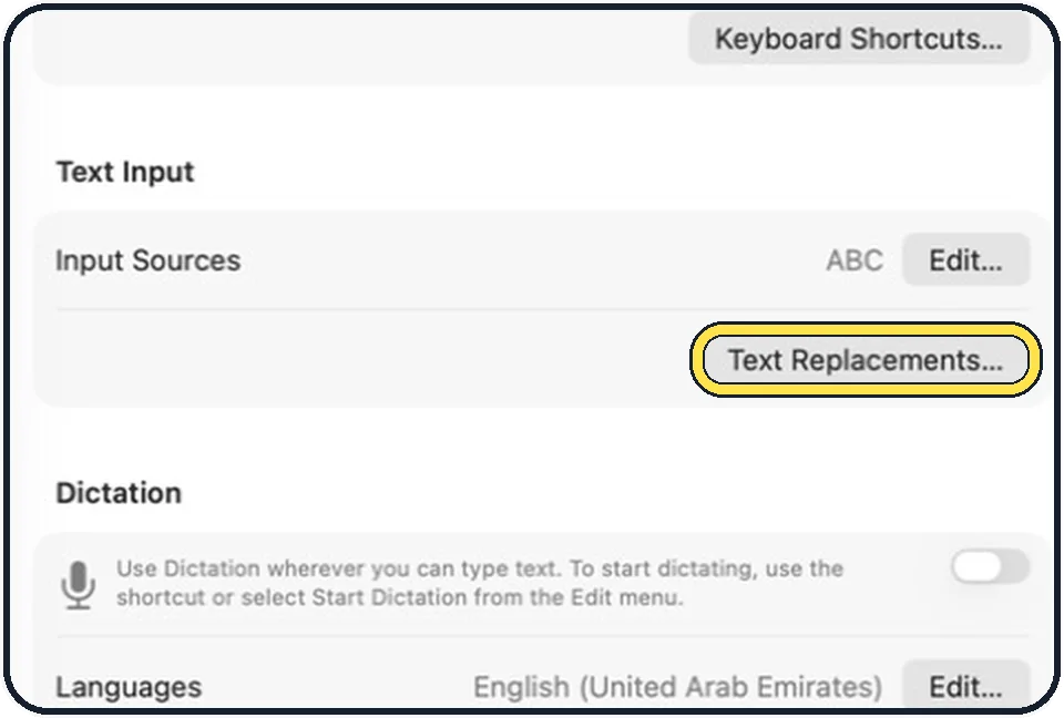 Part of the Mac System Settings window: Click Text Replacements